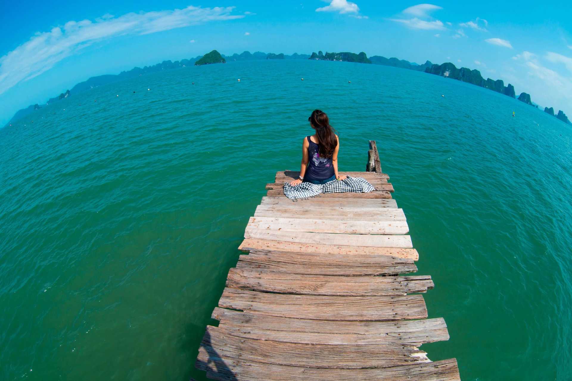 unique-travel-gifts-what-is-a-travel-quest-woman-on-pier